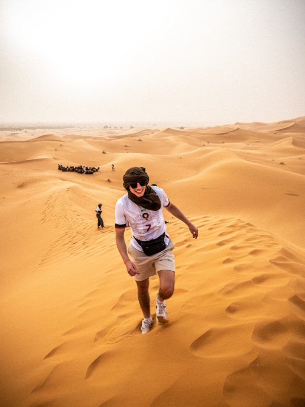 10-day Morocco tour from Casablanca a man walking across a sandy field,10-day Morocco tour from Casablanca